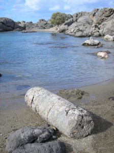 A Marble Column Lies On The sand